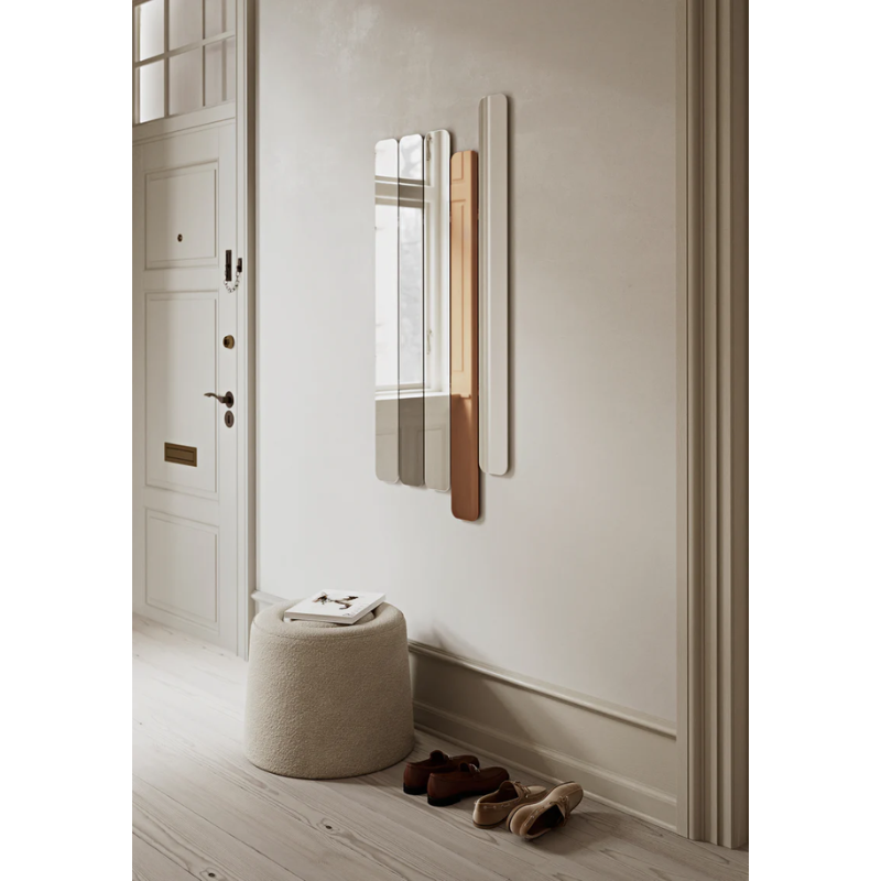 The Logs Mirror from Woud in an entryway.