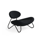 The Meadow Lounge Chair from Woud with black fabric and black legs.
