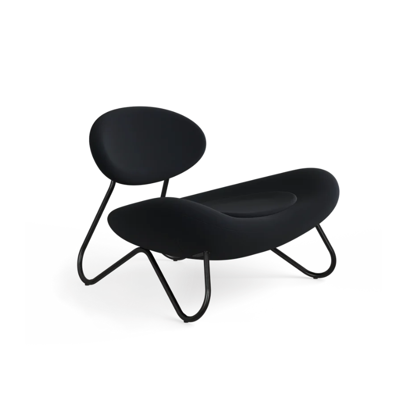 The Meadow Lounge Chair from Woud with black fabric and black legs.