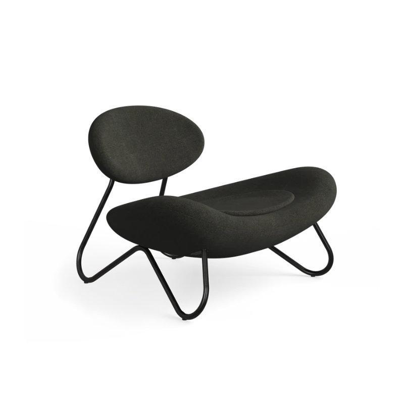 The Meadow Lounge Chair from Woud with dark brown fabric and black legs.