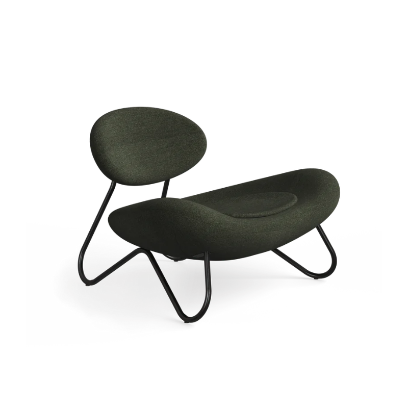 The Meadow Lounge Chair from Woud with pine fabric and black legs.