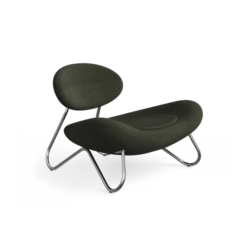 The Meadow Lounge Chair from Woud with pine fabric and chrome legs.