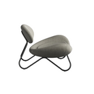 The Meadow Lounge Chair from Woud with warm grey fabric and black legs.