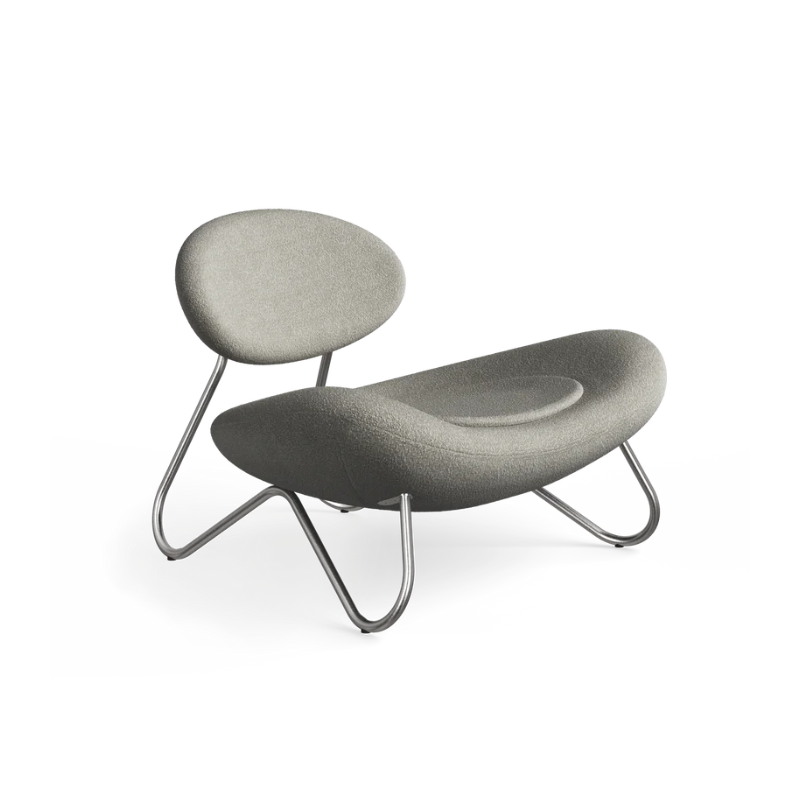 The Meadow Lounge Chair from Woud with warm grey fabric and brushed steel legs.
