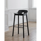 The Mono Bar Stool from Woud in a living room.