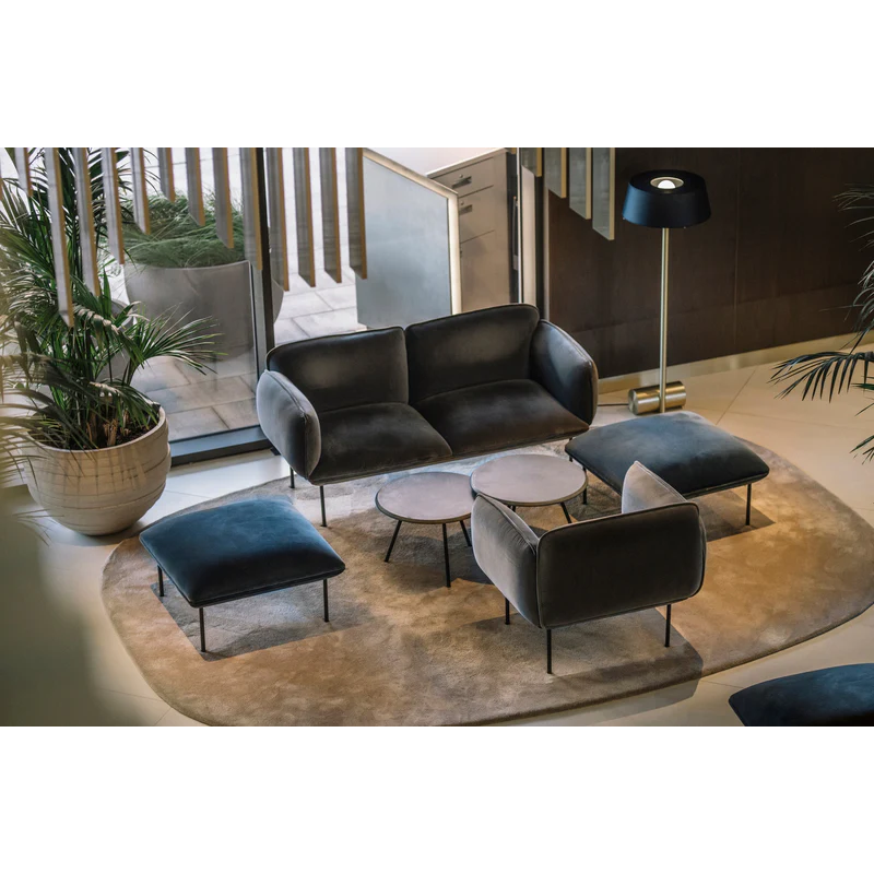 The Nakki 2 Seater from Woud with a custom fabric in a lounge.