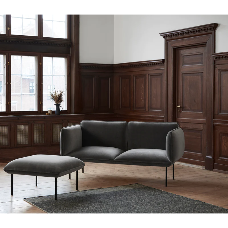 The Nakki Small 2 Seater from Woud with a custom fabric in a living.