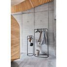 The small and large O&O Clothes Rack from Woud in a lifestyle shot.
