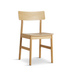The Pause Dining Chair 2.0 from Woud in Oiled Oak.