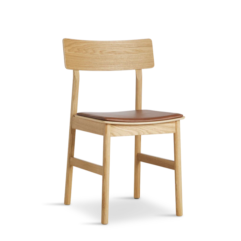 The Pause Dining Chair 2.0 from Woud in Oiled Oak with Leather.