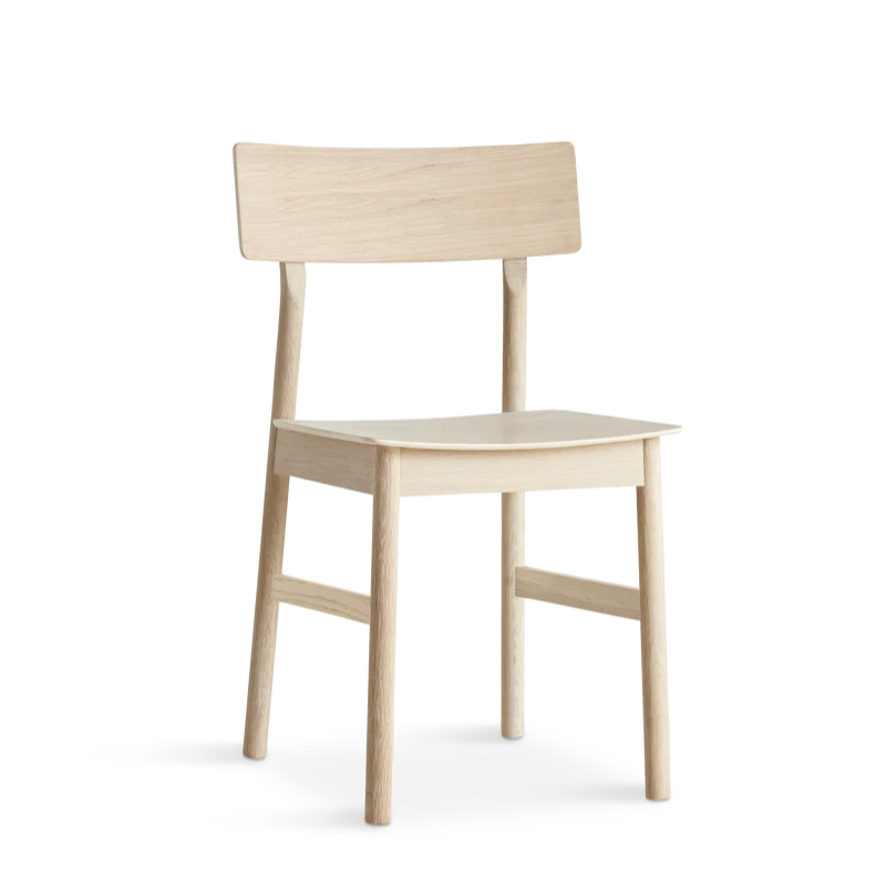 The Pause Dining Chair 2.0 from Woud in White Pigmented Oak.