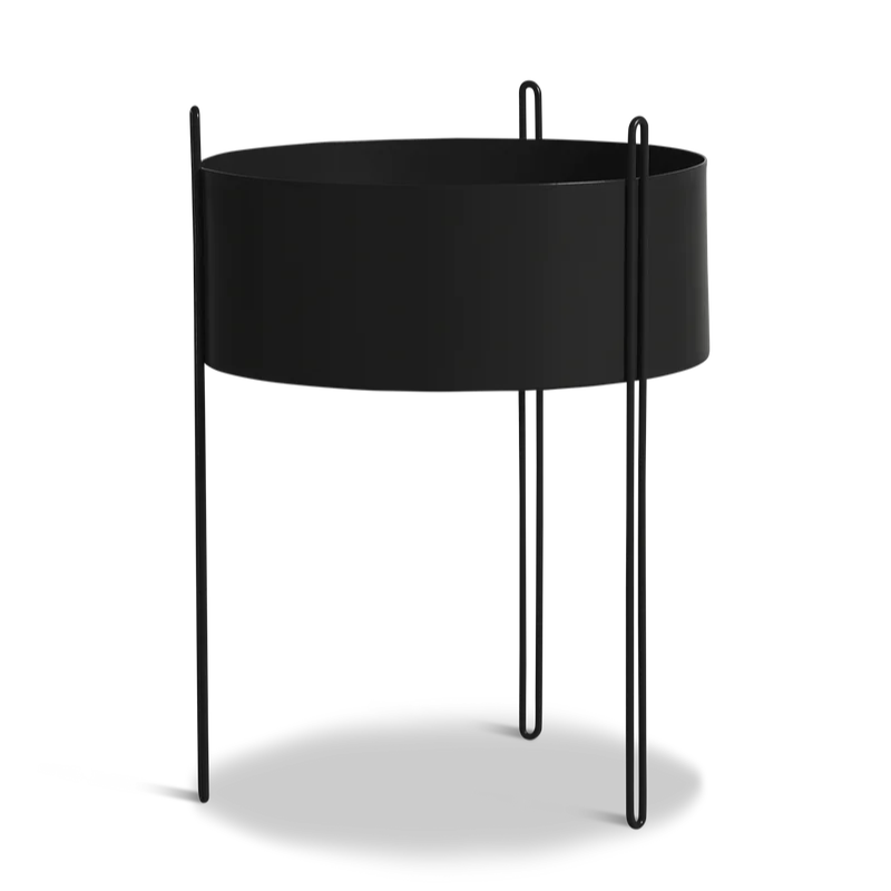 The large Pidestall Planter by Woud in black.