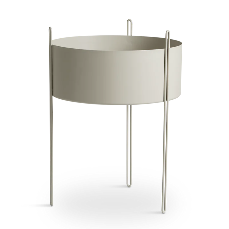 The large Pidestall Planter by Woud in grey.
