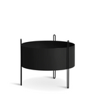 The medium Pidestall Planter which is made with painted metal by Woud in black.