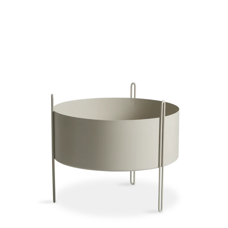 The medium Pidestall Planter by Woud in grey.
