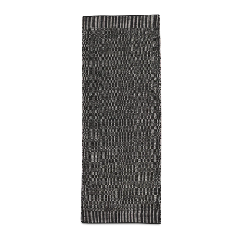The Rombo Rug from Woud in grey and 75 by 200 cm size.