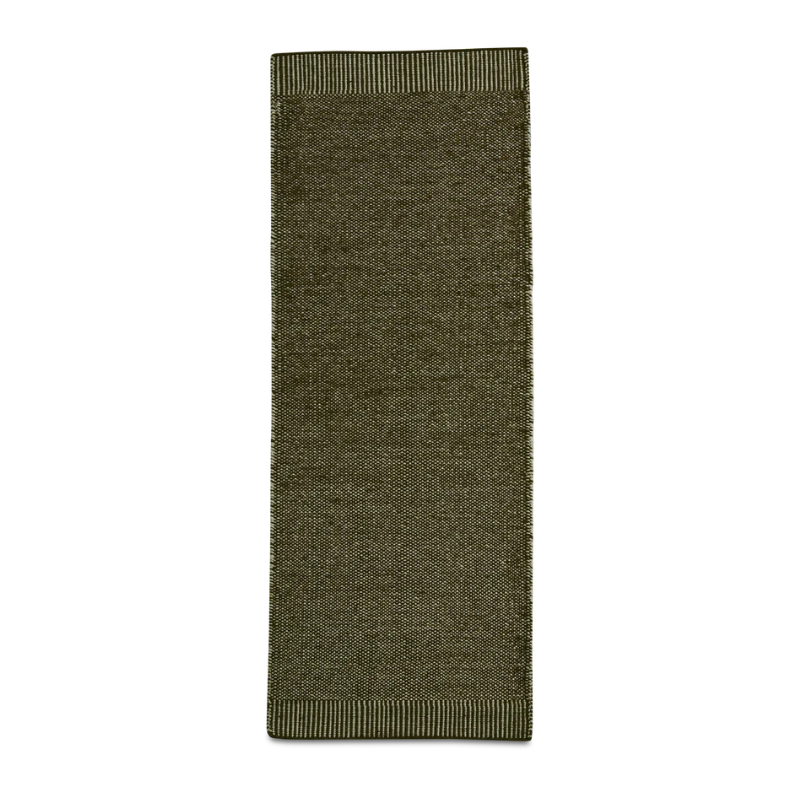 The Rombo Rug from Woud in moss green and 75 by 200 cm size.