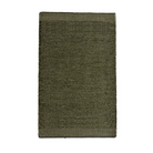 The Rombo Rug from Woud in moss green and 90 by 140 cm size.