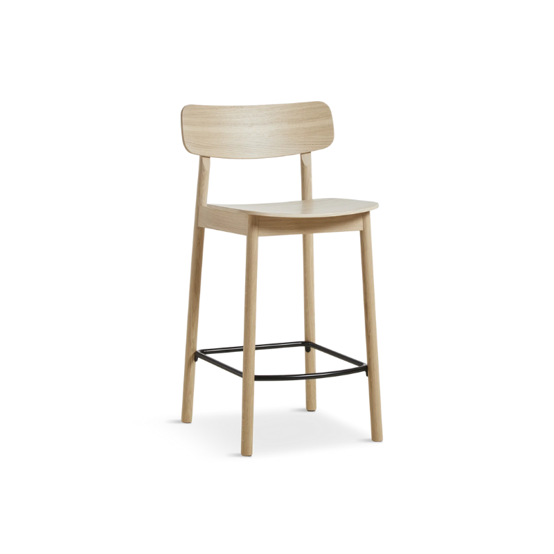 The Soma Counter Chair from Woud in white pigmented oak.