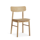 The Soma Dining Chair from Woud in Oiled Oak.