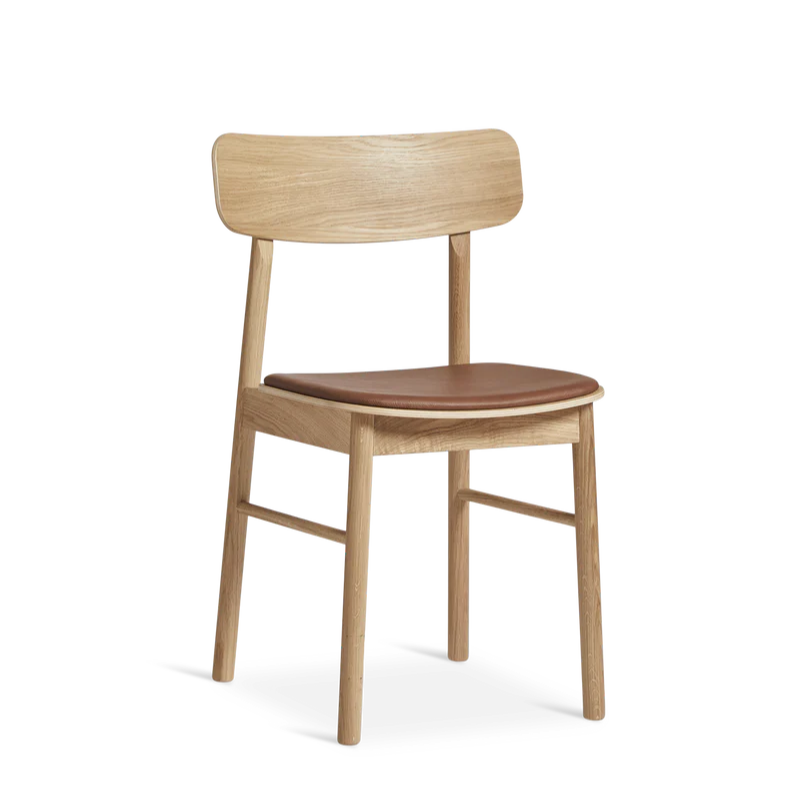 The Soma Dining Chair from Woud in Oiled Oak with Leather.