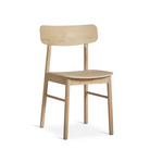 The Soma Dining Chair from Woud in White Pigmented Oak.