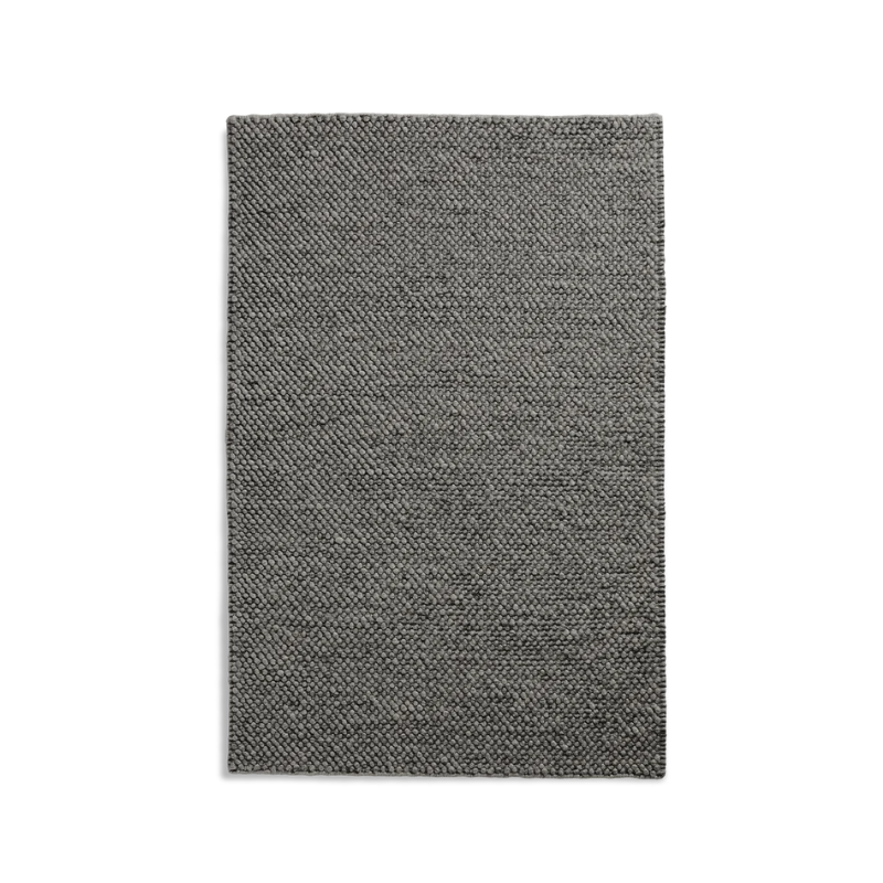 The Tact Rug from Woud in anthracite grey, 170 by 240 cm.