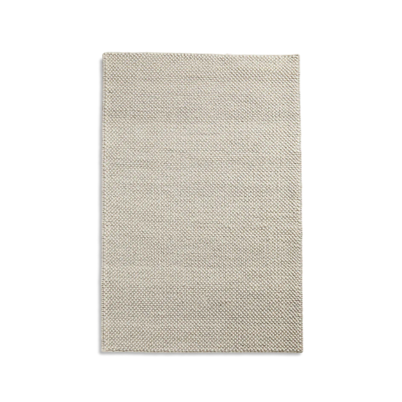 The Tact Rug from Woud in off white, 170 by 240 cm.