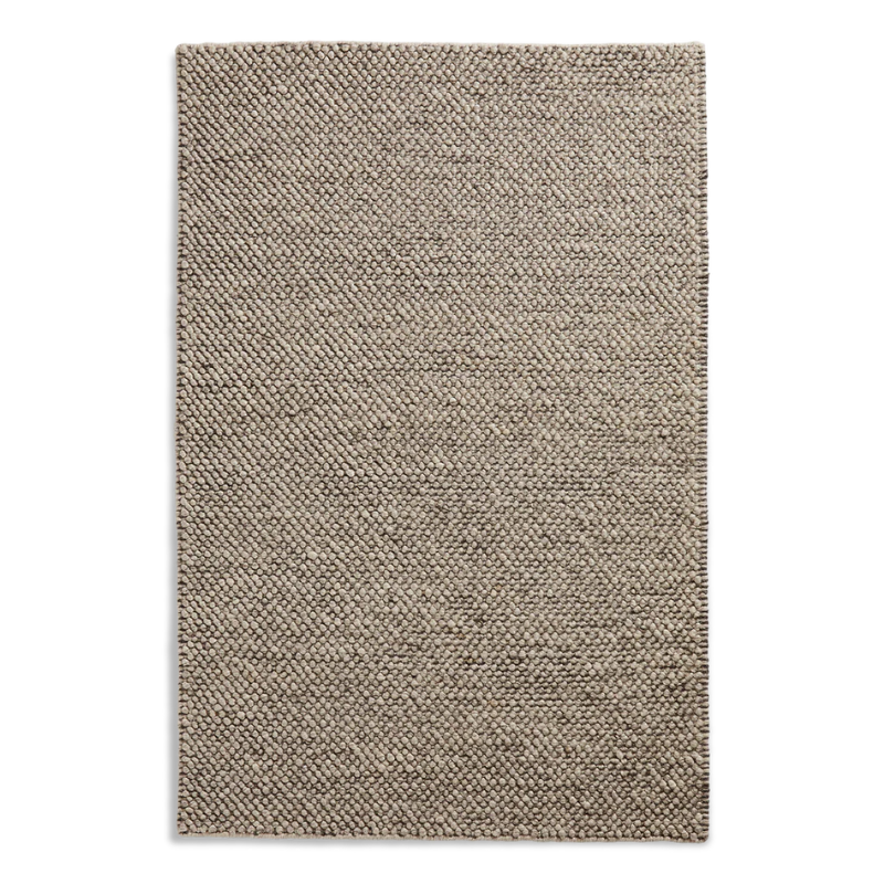 The Tact Rug from Woud in brown, 200 by 300 cm.