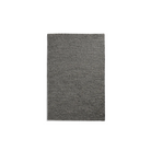 The Tact Rug from Woud in anthracite grey, 90 by 140 cm.