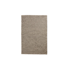 The Tact Rug from Woud in brown, 90 by 140 cm.