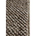 A close up on the fabric used for the Tact Rug from Woud in brown.