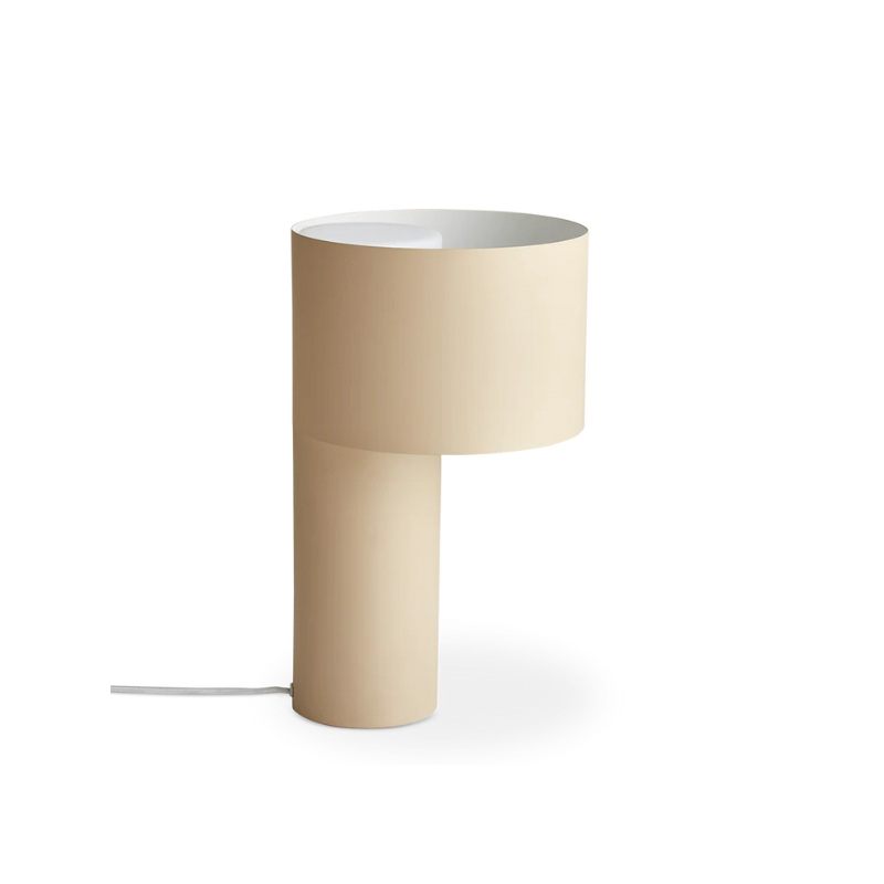 The Tangent Table Lamp from Woud in desert sand.