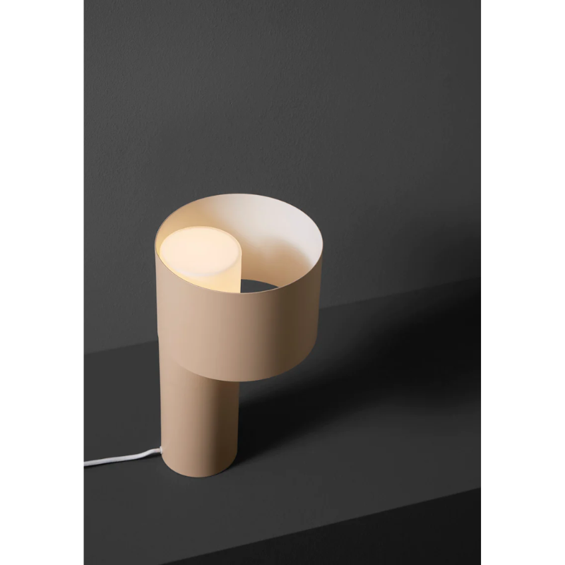 The Tangent Table Lamp from Woud in a studio lifestyle photograph.
