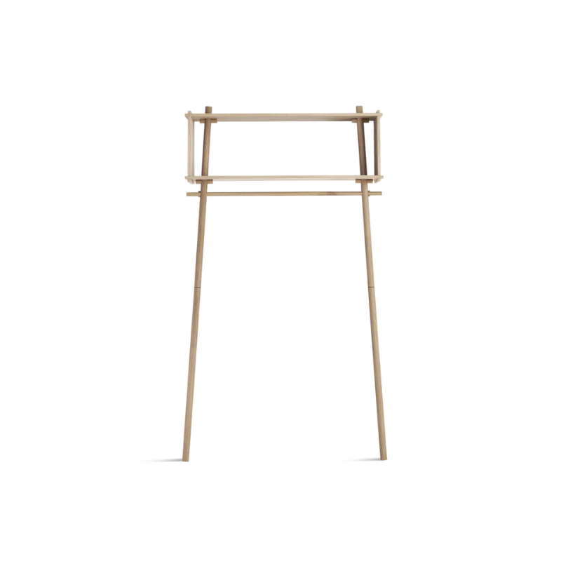 The Töjbox Wardrobe from Woud in the large size and white pigmented oak color.