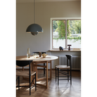 The Flowerpot VP2 Pendant Light from &Tradition in a dining room.
