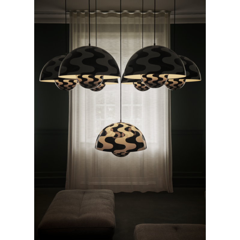 The Flowerpot VP2 Pendant Light from &Tradition in a living room.