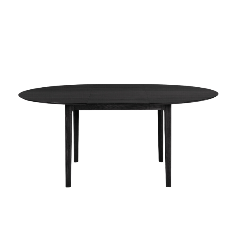 The Round Bok Extendable Dining Table from Ethnicraft in solid oak, tainted black.