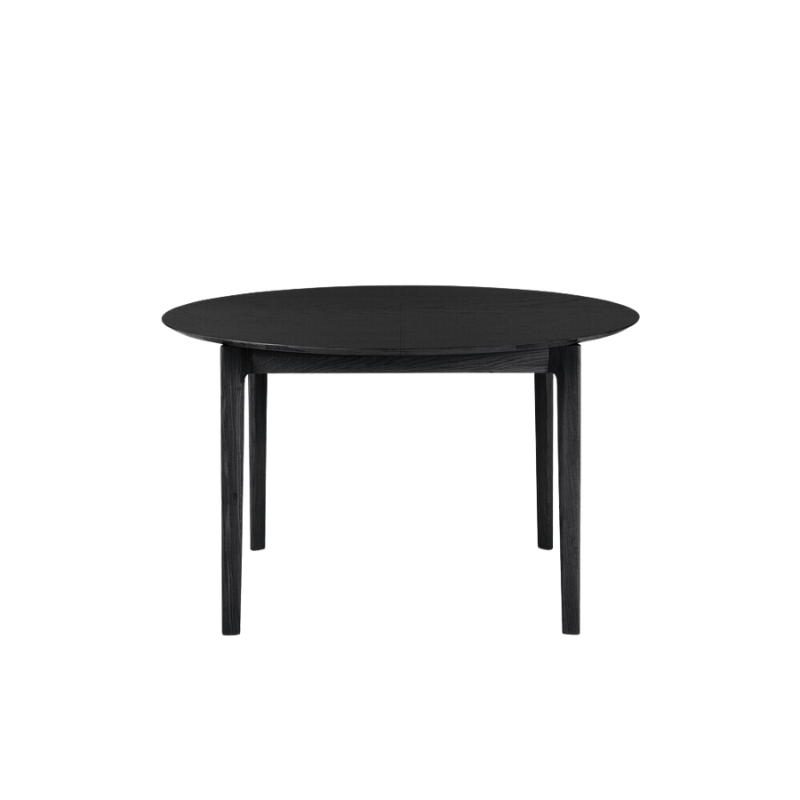 The Round Bok Extendable Dining Table from Ethnicraft in solid oak, tainted black.