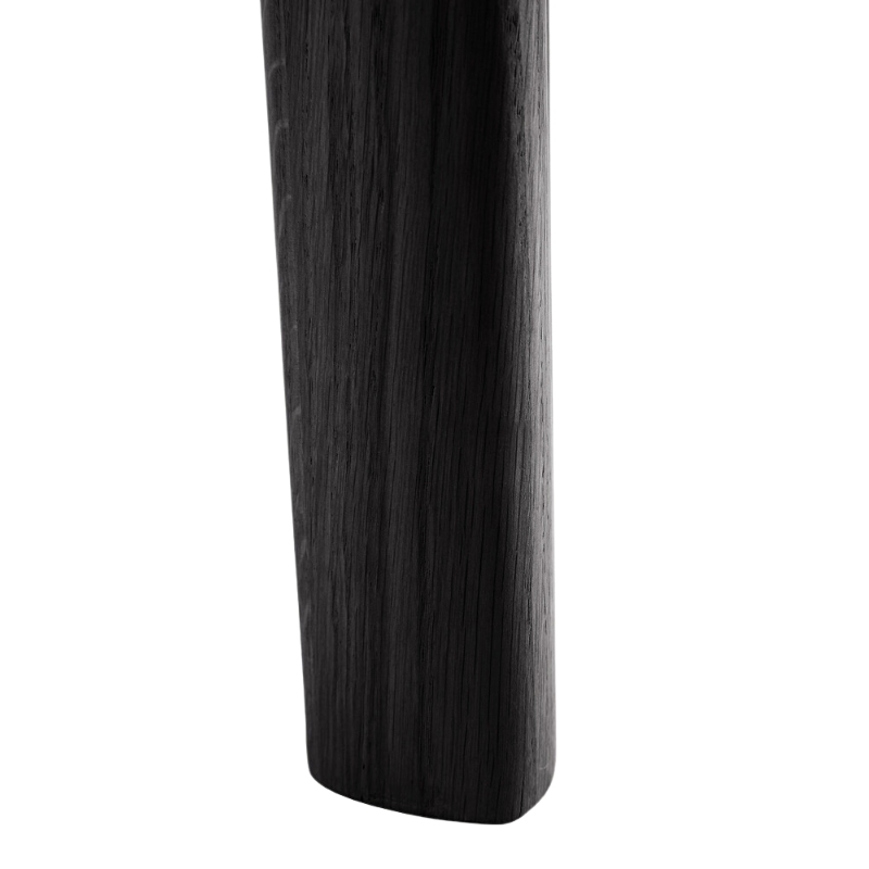 The Round Bok Extendable Dining Table from Ethnicraft in solid oak, tainted black.