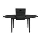 The Round Bok Extendable Dining Table from Ethnicraft in solid oak, tainted black.