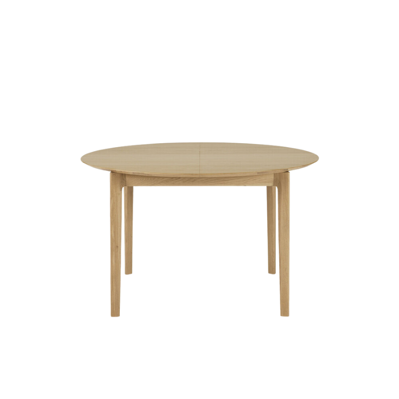 The Round Bok Extendable Dining Table from Ethnicraft in solid oak.