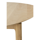 The Round Bok Extendable Dining Table from Ethnicraft in solid oak.