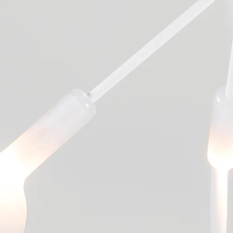 The white Heracleum III Suspended from Moooi close up.