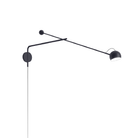 The antracite gray Ixa Arm Plug In Wall Sconce from Artemide.