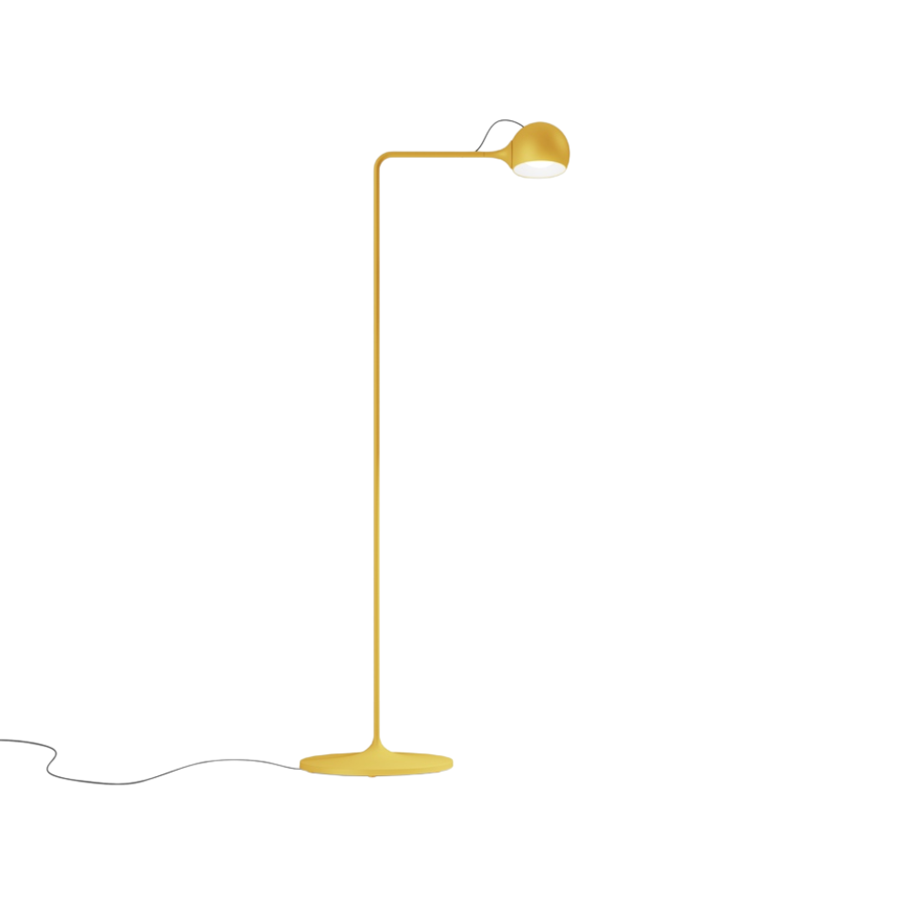 The yellow Ixa Reading Floor Lamp from Artemide.