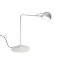 The white Ixa Table Lamp from Artemide.
