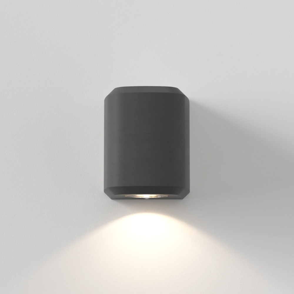 The Brixham Wall Single outdoor sconce in charcoal concrete by Astro Lighting from the front.