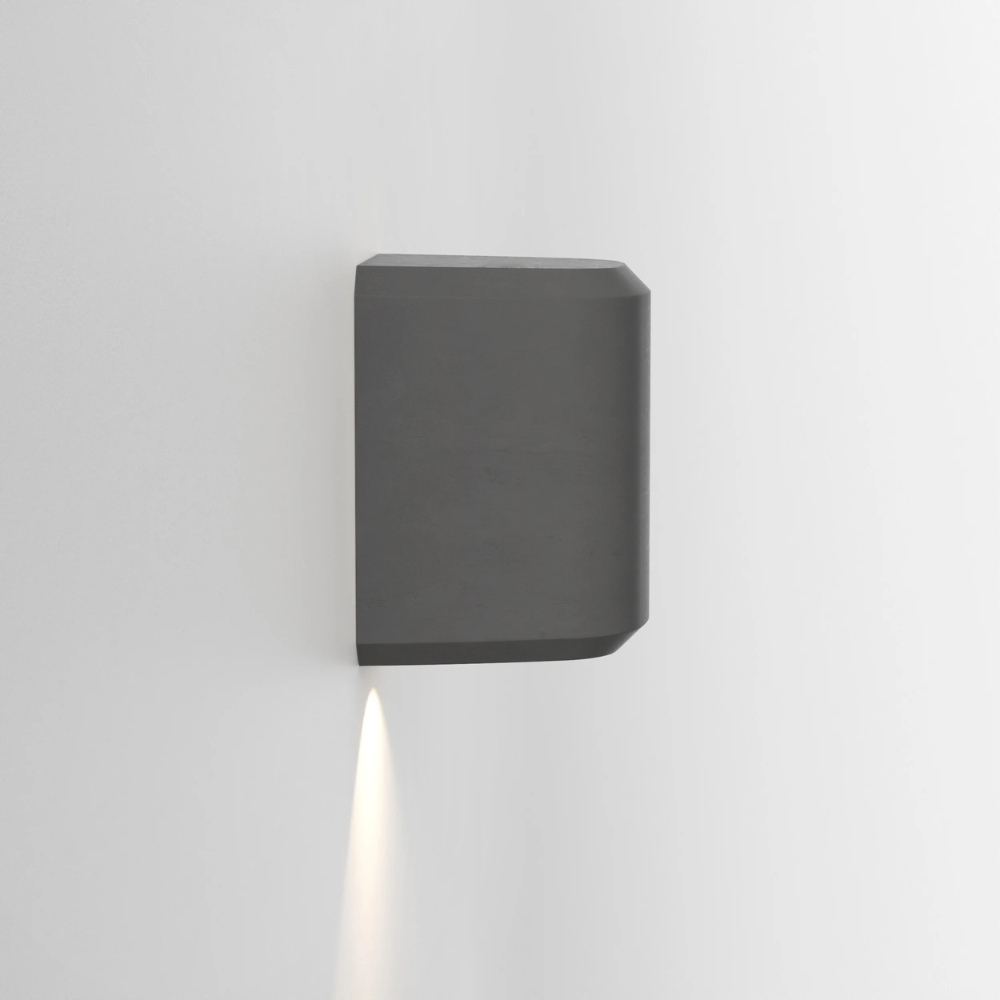 The Brixham Wall Single outdoor sconce in charcoal concrete by Astro Lighting from profile.