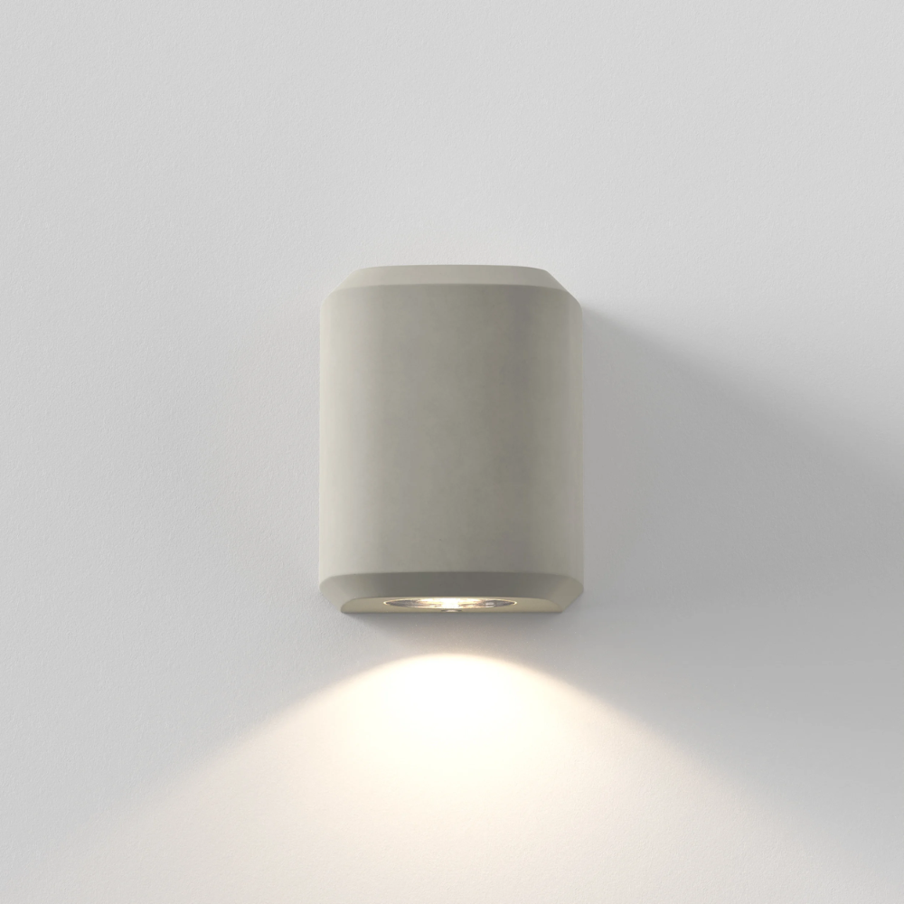 The Brixham Wall Single outdoor sconce in grey concrete by Astro Lighting from the front.